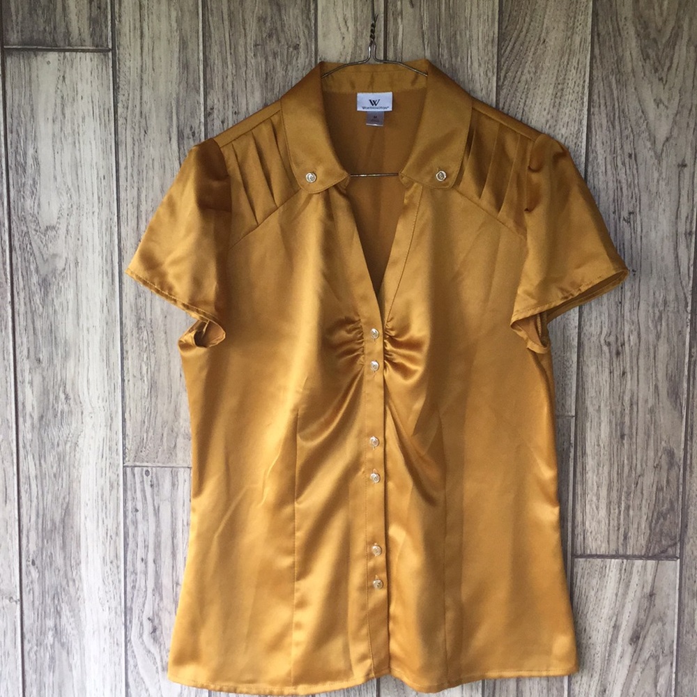 Woman’s dressy gold medium blouse